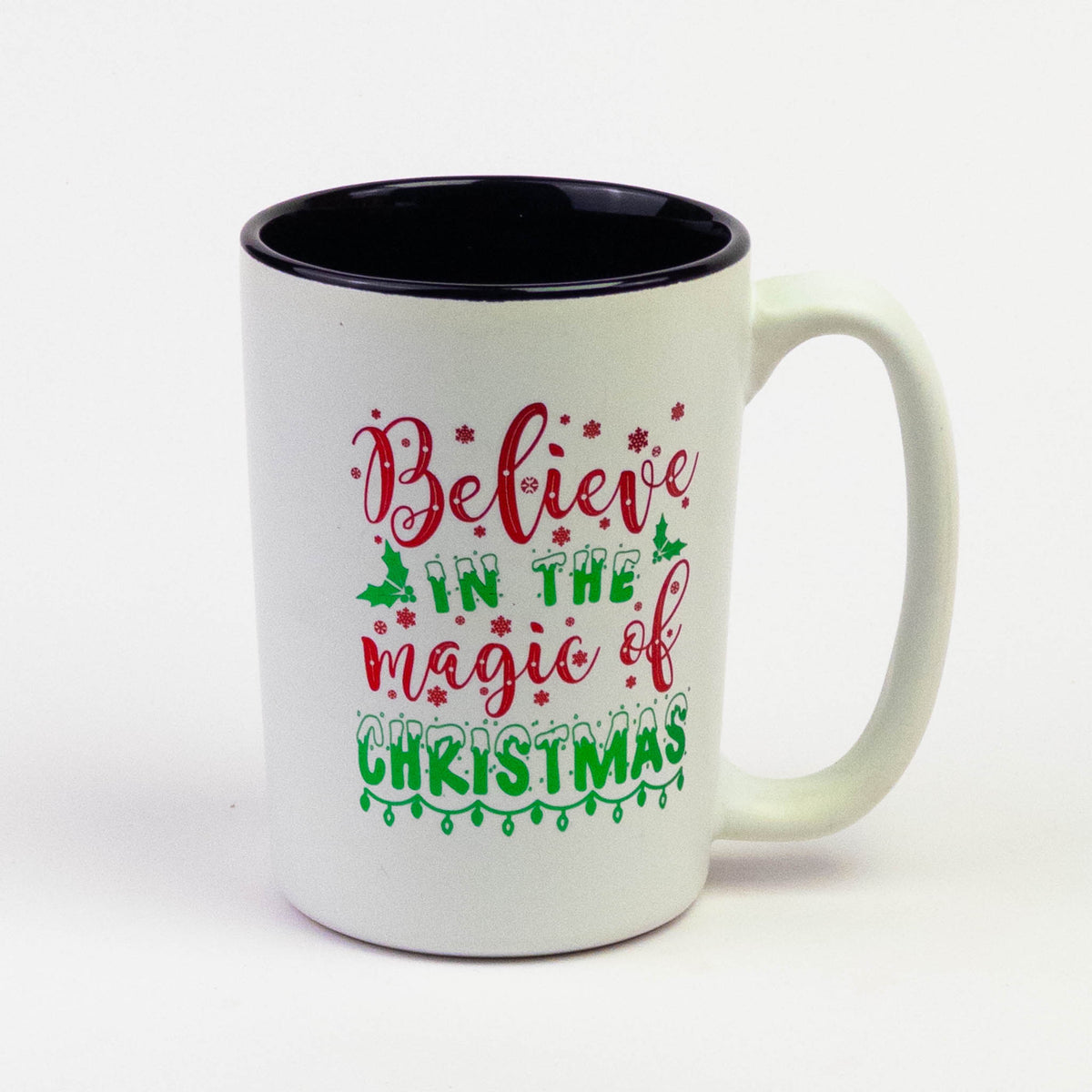 Tall Christmas quote mug "Believe in the Magic of Christmas" with black inside