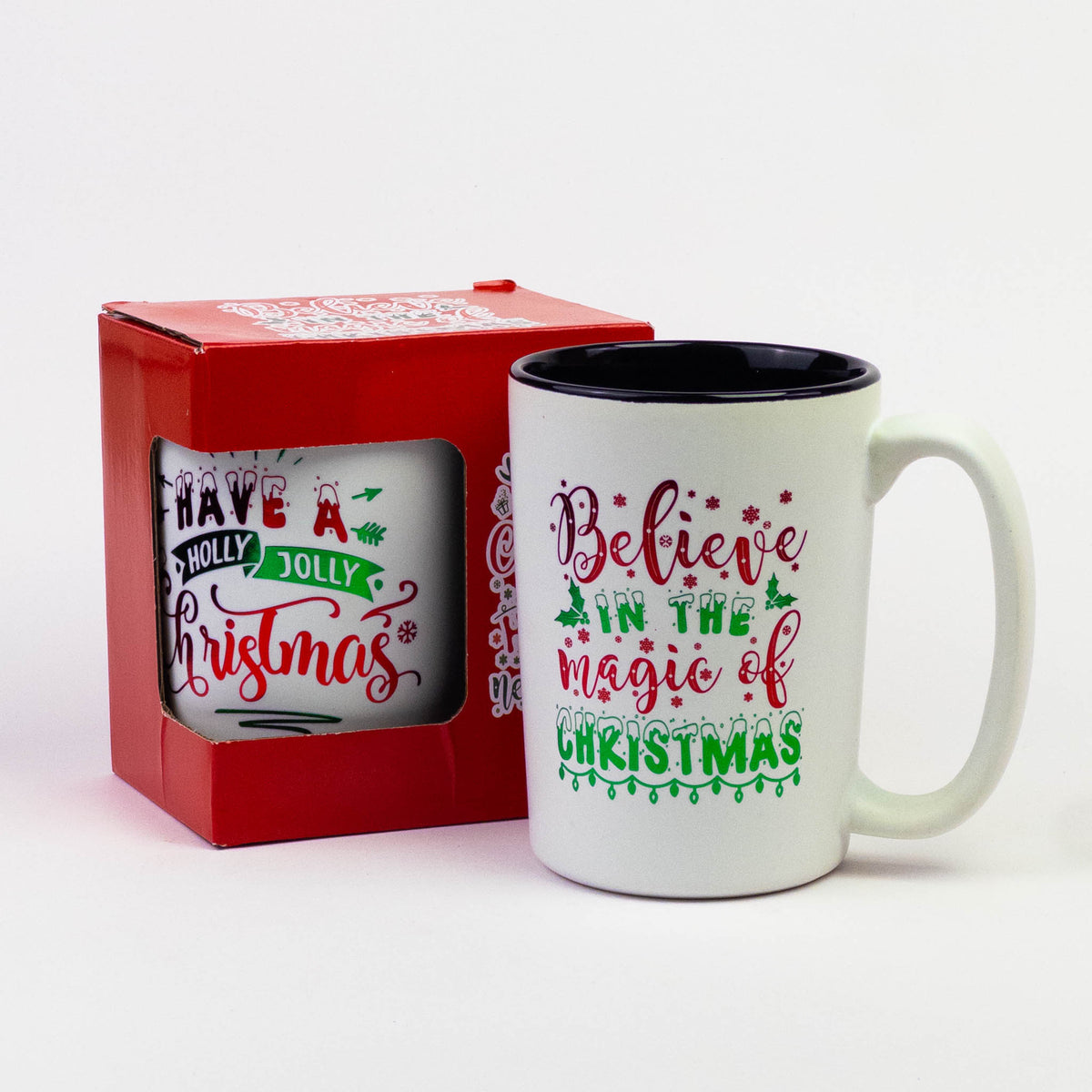 Tall Christmas quote mug "Believe in the Magic of Christmas" next to its gift box