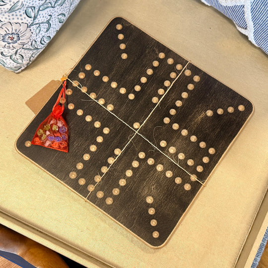 Wahoo and Jackaroo wooden board with a bag of marbles