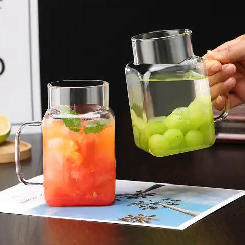 Square glass mason jar with bamboo lid and glass straw