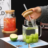 Square glass jar with handle, lid and straw