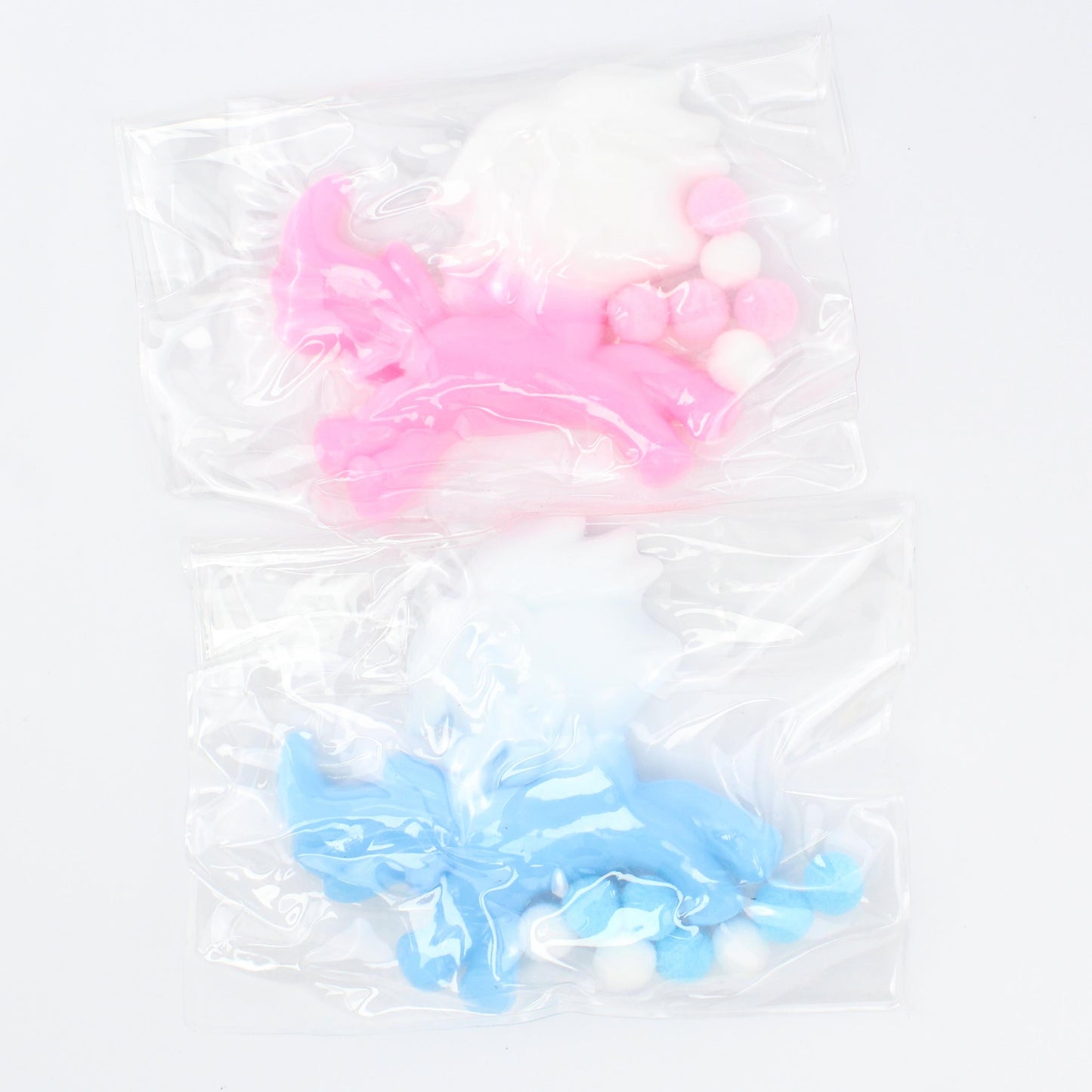 Pink and blue slime with bubbles on a white background