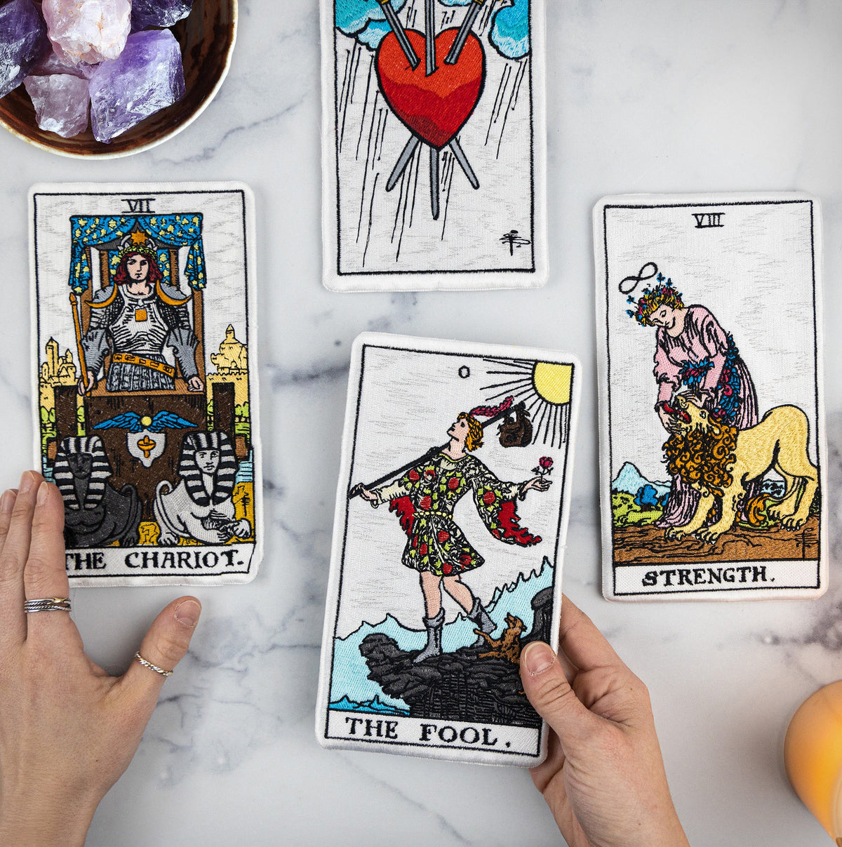 Classic tarot cards: The Fool, The Chariot and Strength