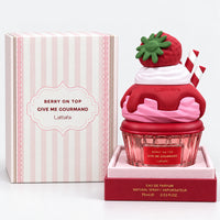 Berry On Top cupcake perfume next to its pink striped gift box