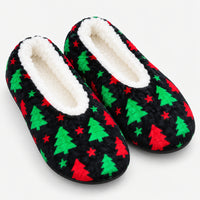 Black Christmas slippers with a green tree and red star print
