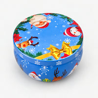 Blue Christmas candle tin with Christmas characters and a gold bow