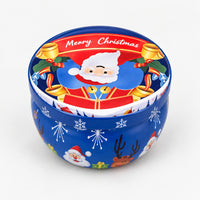 Blue Christmas candle tin with a Santa banner