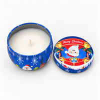 Blue Christmas candle tin with a Santa banner, open with a white candle inside