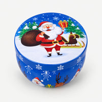 Blue Christmas candle tin with Santa and his sleigh