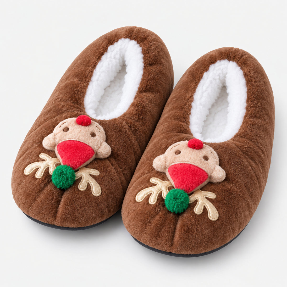 Brown fuzzy Christmas slippers with a reindeer face and pompom nose