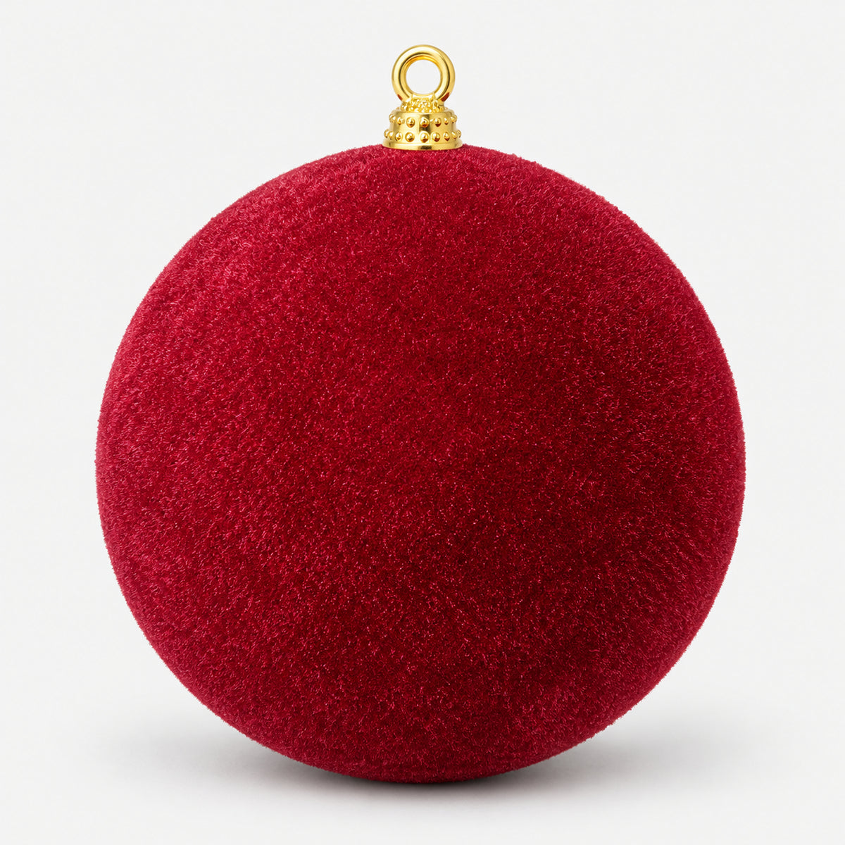 Burgundy velvet Christmas ball with a soft, fuzzy finish and a gold cap
