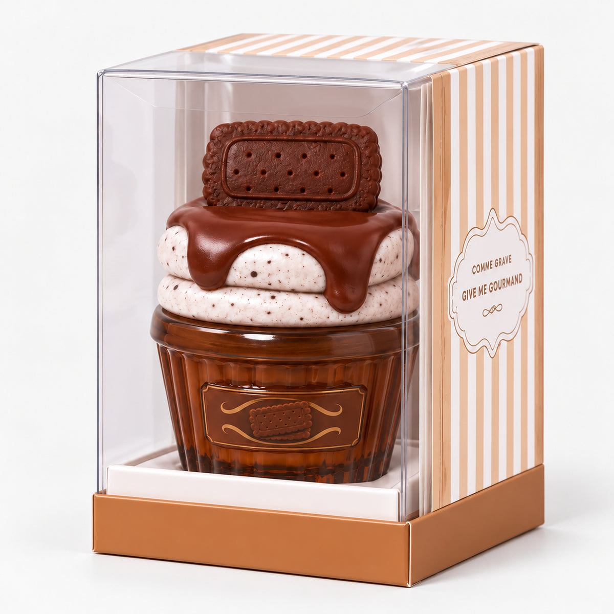 Chocolate cookie cupcake perfume in its striped gift box with a clear window