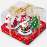 Christmas tea light candle set in a clear box with a gold ribbon