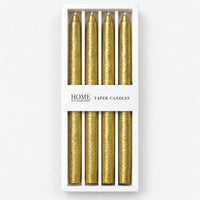 Gold metallic taper candles in their window box