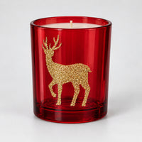 Red glass Christmas candle with a gold glitter reindeer