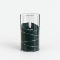 Green 10cm LED candle in a clear cup with fairy lights, switched off