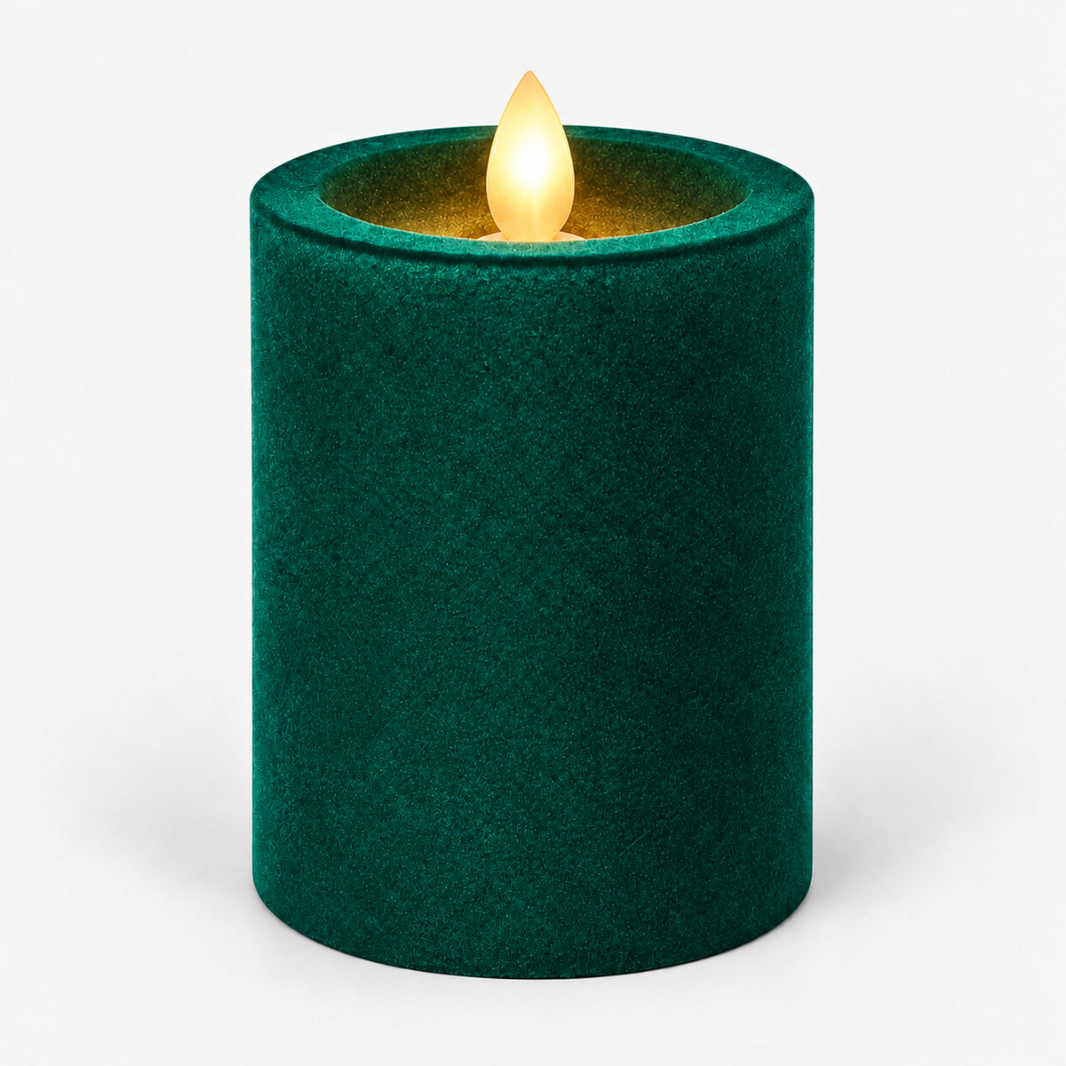 Green 10 cm LED pillar candle glowing with a dancing flame