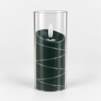 Green 15cm LED candle in a clear cup with fairy lights, switched off