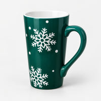 Green Christmas mug with white snowflakes and dots