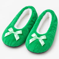 Green fuzzy Christmas slippers with a satin bow