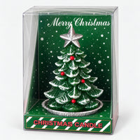 Green Christmas tree candle in a clear Merry Christmas gift box