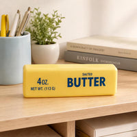 Butter stick squishy on a desk