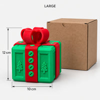 Large green & red prank gift box next to its kraft box