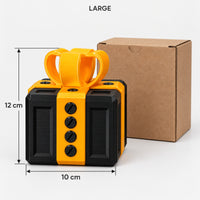 Large black & gold prank gift box next to its kraft box