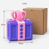 Large purple & pink prank gift box next to its kraft box