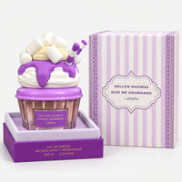 Mallow Madness cupcake perfume next to its purple striped gift box