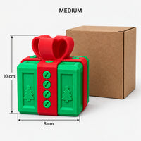 Medium green & red prank gift box next to its kraft box