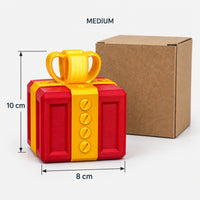 Medium red & gold prank gift box next to its kraft box