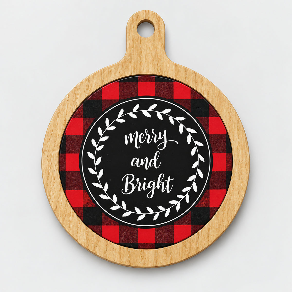 Red buffalo plaid Christmas coaster with a wood-look frame and Merry and Bright