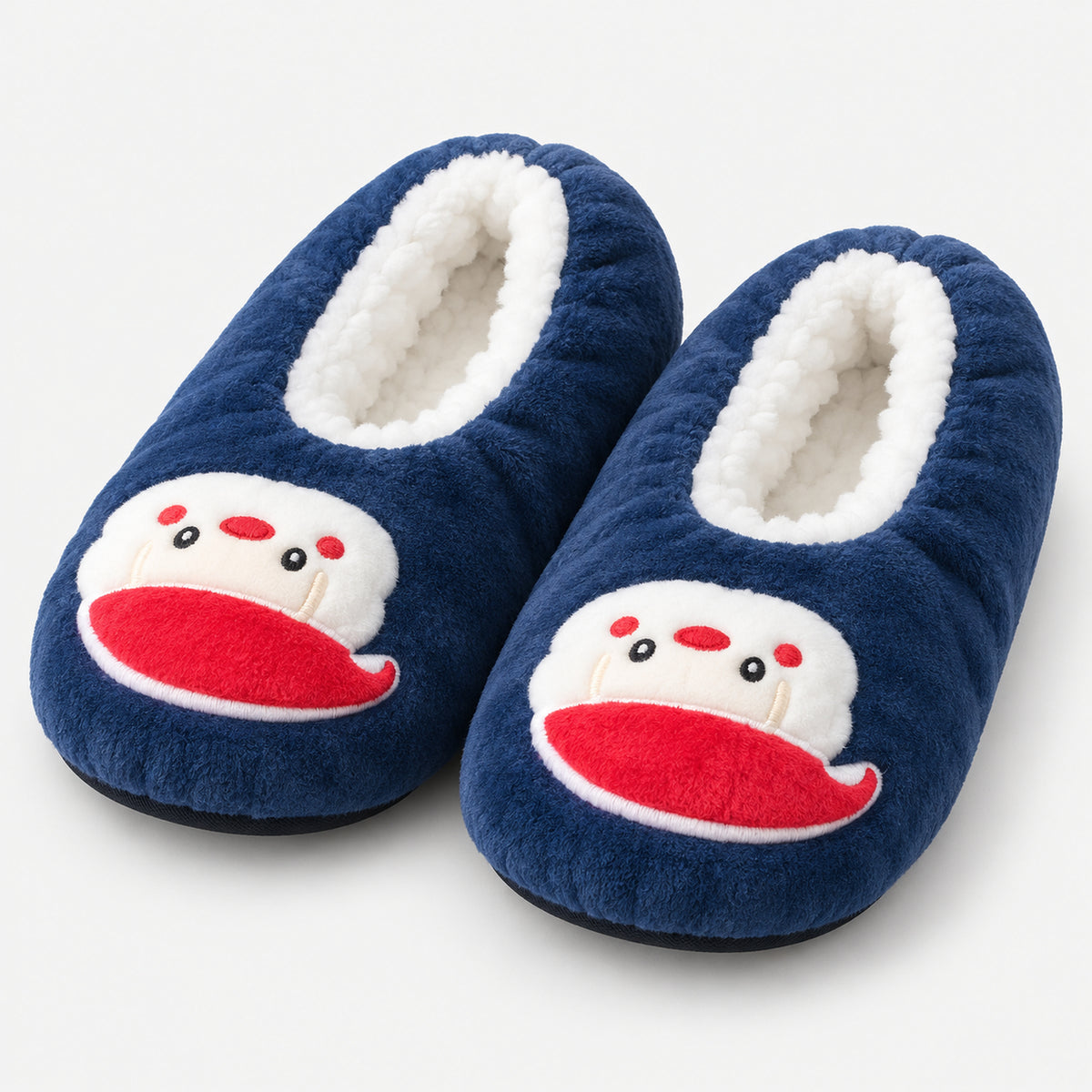 Navy fuzzy Christmas slippers with a snowman face patch