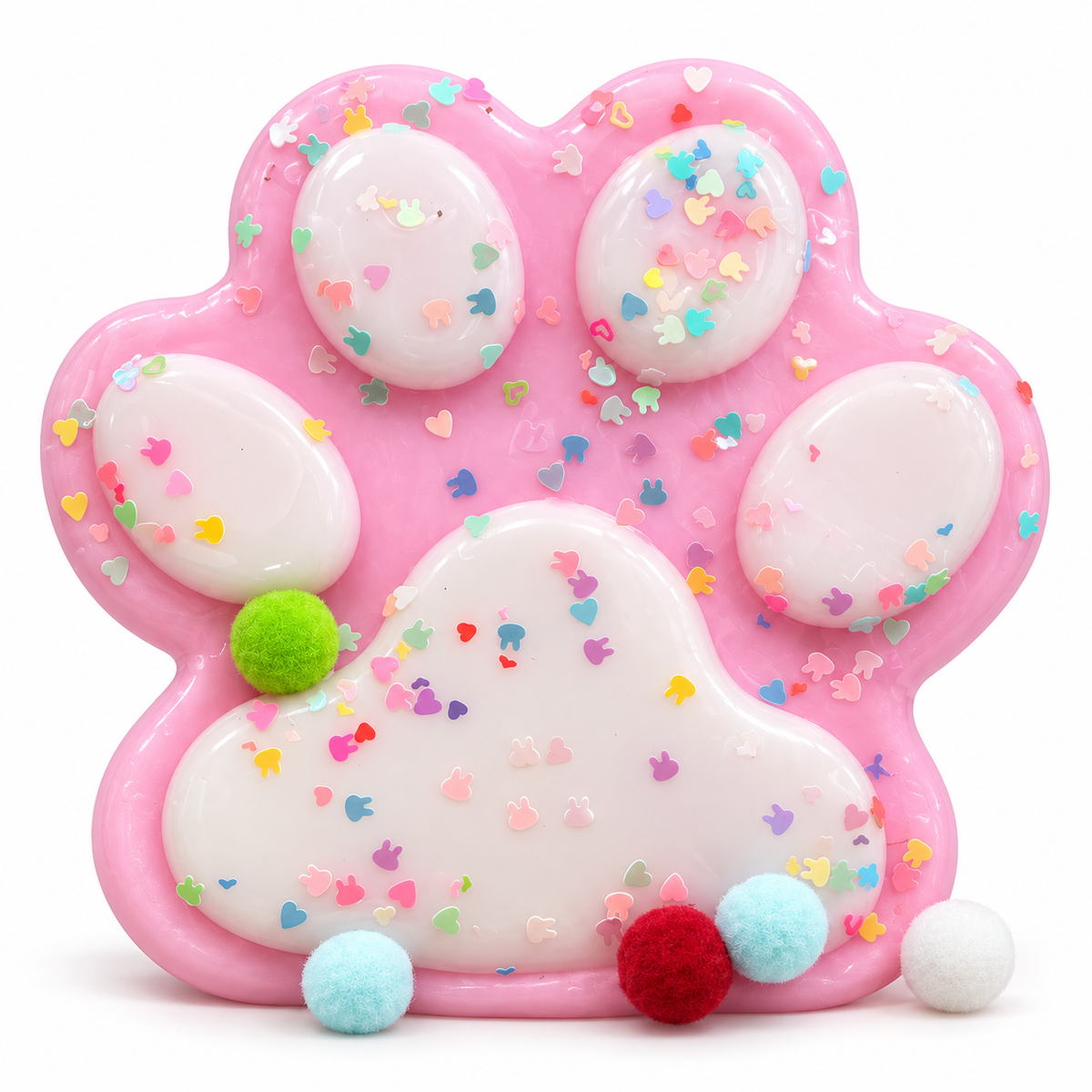 Big pink cat paw squishy with sprinkles and pompoms
