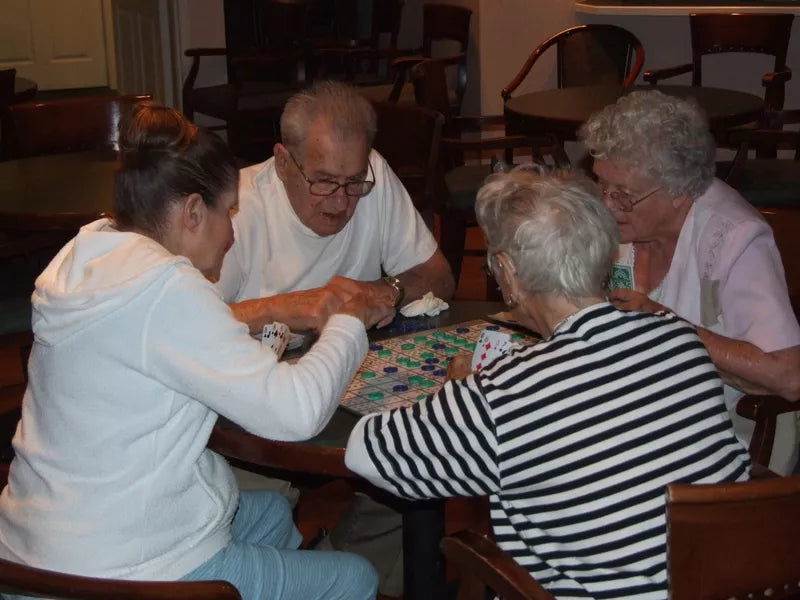 Grandparents playing SEQUENCE together