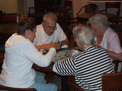 Grandparents playing SEQUENCE together