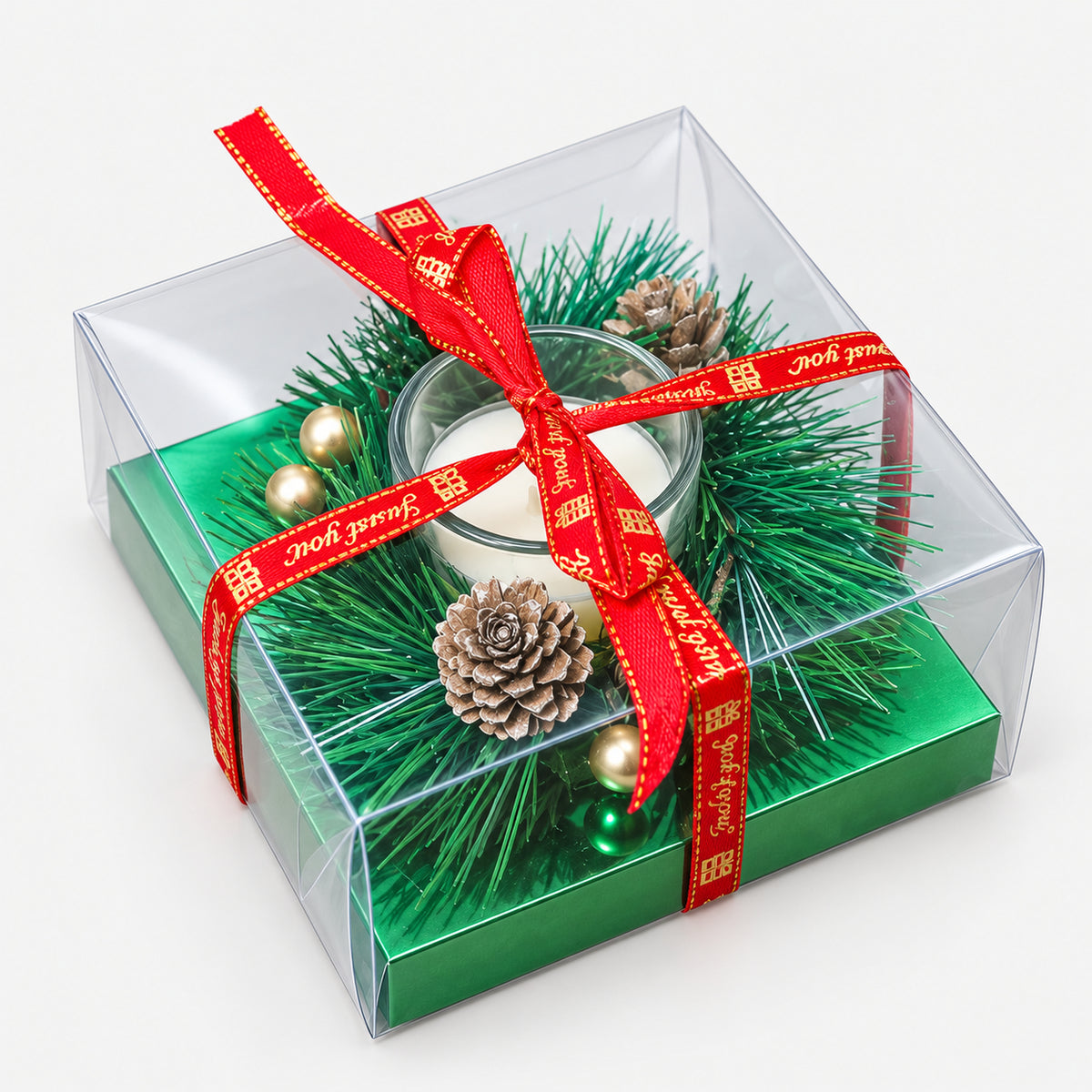 Pine wreath tealight candle holder in a gift box with a red ribbon