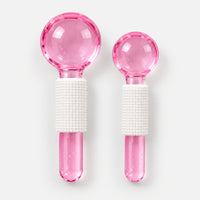 2 pink facial massage crystal balls, large and small, with white grips