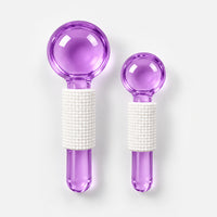 2 purple facial massage crystal balls, large and small, with white grips