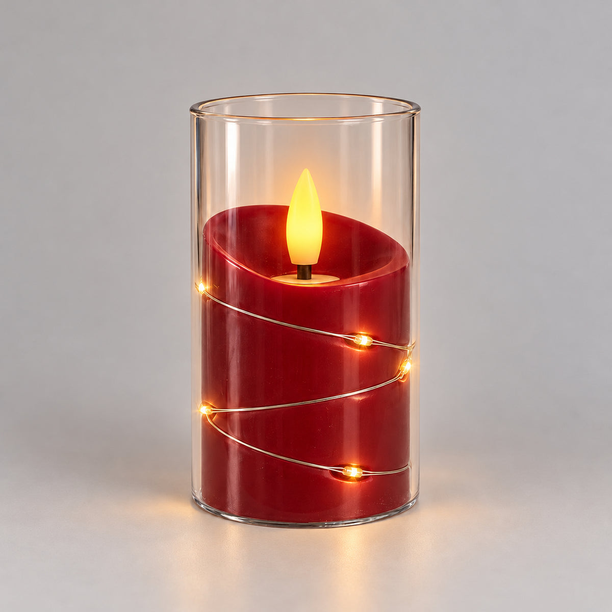 Red 10cm LED candle cup glowing with warm fairy lights