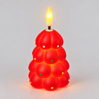 Red Christmas tree LED candle glowing with a warm LED flame
