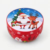 Red Christmas candle tin with Santa and a reindeer
