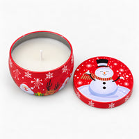 Red Christmas candle tin with a snowman, open with a white candle inside