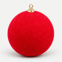 Red velvet Christmas ball with a soft, fuzzy finish and a gold cap