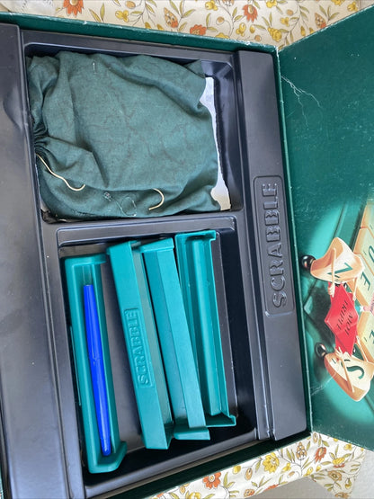Inside the Scrabble Classique box: letter bag and tile racks