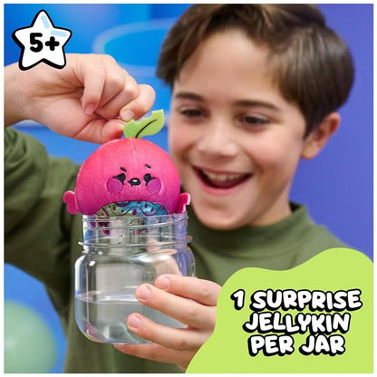 Boy revealing a Jellykins plush from the jar