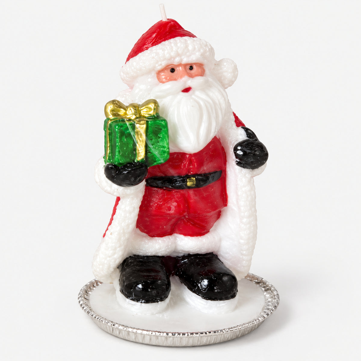 Santa Christmas candle holding a green gift on a silver tray