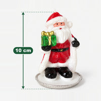 Santa Christmas candle measuring 10 cm high