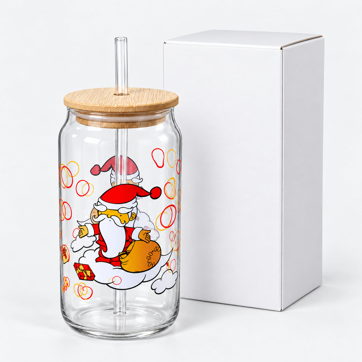 Santa with gift sack glass cup next to its white box